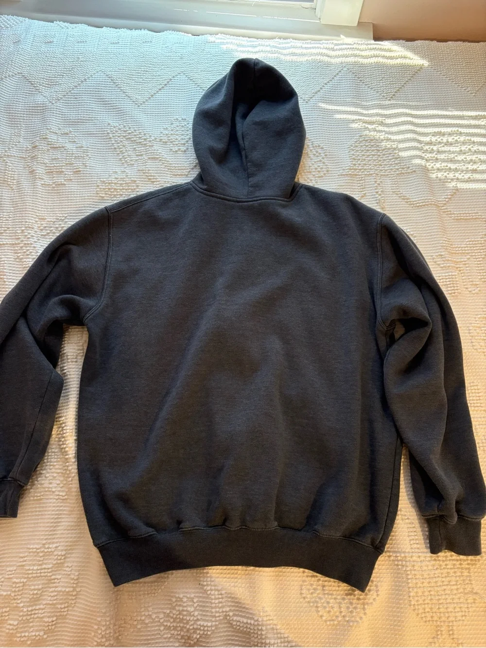 Carhartt Y2K Charcoal Gray Zip-Up Hoodie with Vertical Logo and Orange Accent.